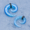 Los túneles materiales de acrílico de los auriculares tuercen en espiral color azul brillante con los aros de cuero